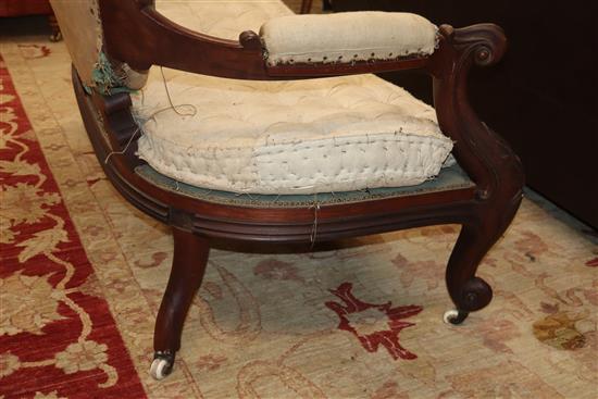 A Victorian carved rosewood open arm settee W.132cm
